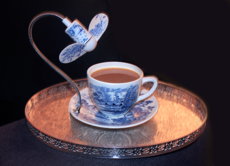 Tea cup and saucer with cooling fan by Dominic Wilcox